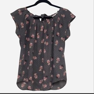 LC Lauren Conrad flowy top with a floral and polka dot pattern.